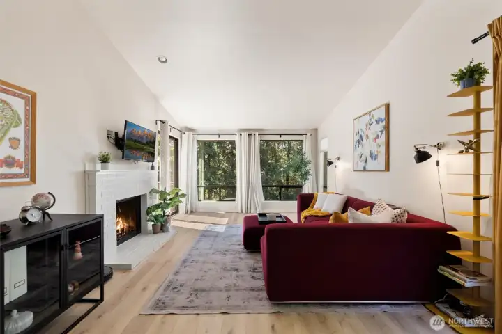 Soaring vaulted ceilings and huge windows in the main living areas of this home!