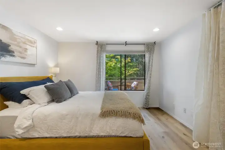 Primary bedroom is spacious and delightful.