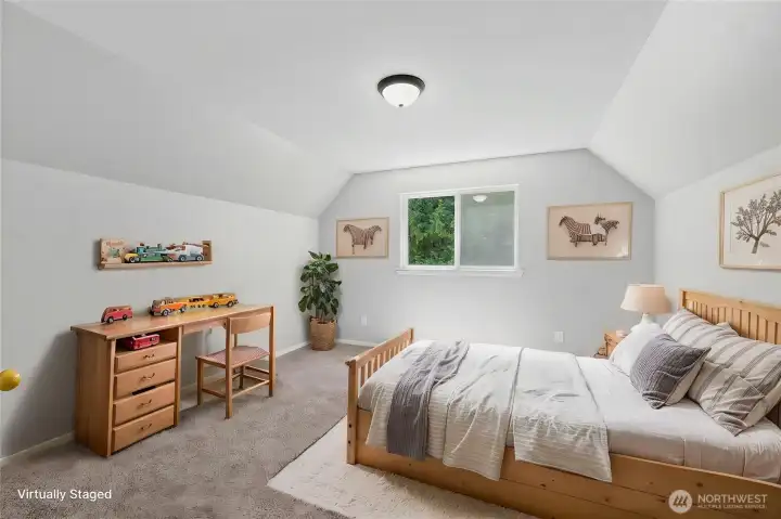 Upper level bedroom 1  Virtually staged