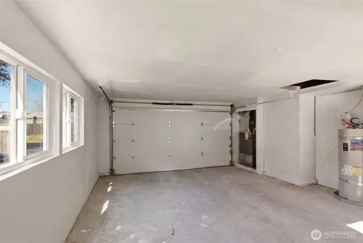 Garage with access door to backyard. Garage with access door to backyard.