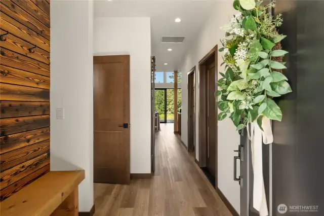 Built in bench at entry, lvp flooring throughout main living area.