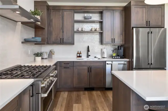 The kitchen in the model home. Finishes, cabinetry, appliances may vary.
