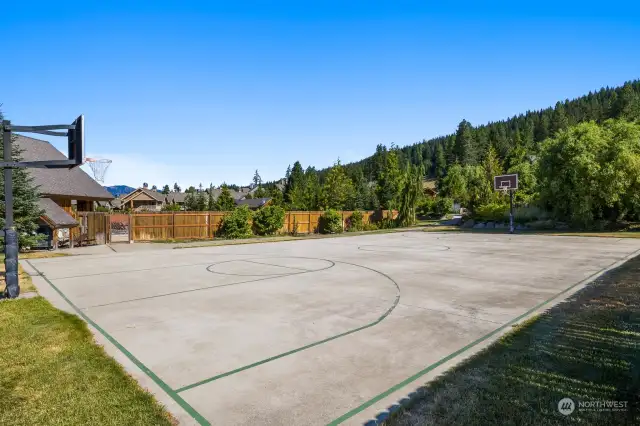 Basketball courts are on one side of the pool area, tennis courts on the other.