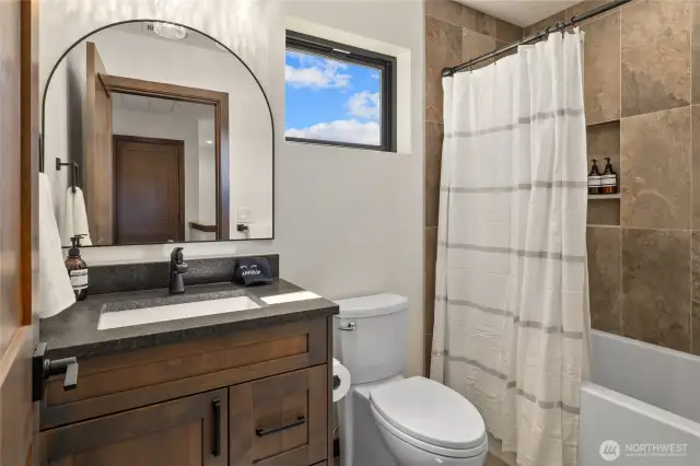 Shared bath on upper level. Finishes, fixtures, etc. may vary.