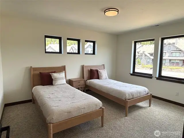 One of two bedrooms on upper level. This photo is of the model home.
