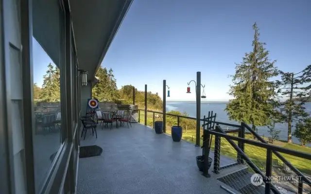 Generous deck overlooks bay views