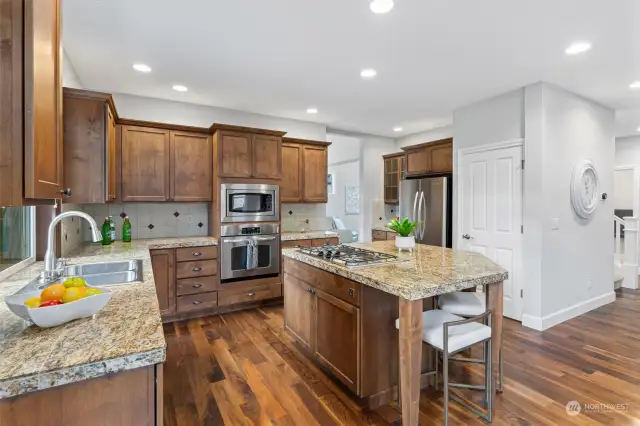 This kitchen is a storage dream, featuring an abundance of cabinets & a convenient lazy Susan to keep everything organized & within reach.