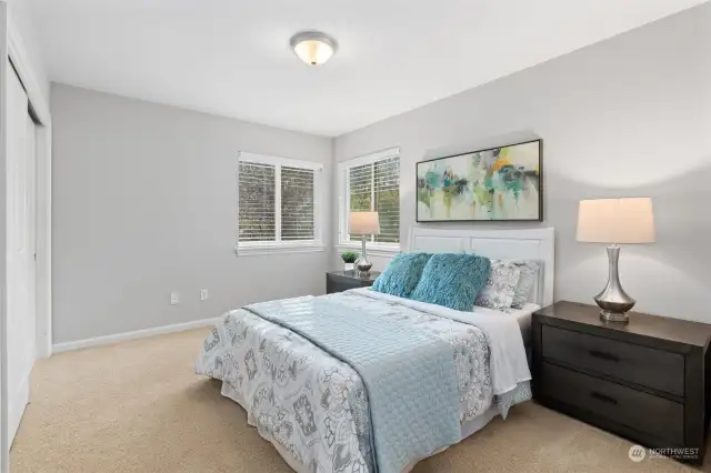 In addition to your primary suite, your upper level features three more spacious bedrooms all with reorganizable closets that have rearrangeable shelves & hanging rods.