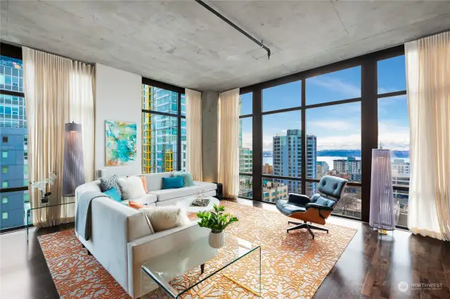 Corner home with floor-to-ceiling glass.