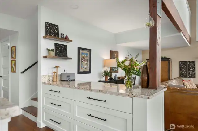 Extra cabinets that could be used as a buffet/serving area.