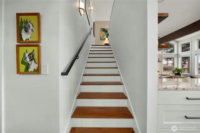 Beautiful stairway with custom handrail.