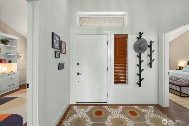 Entryway with bedrooms on each side.