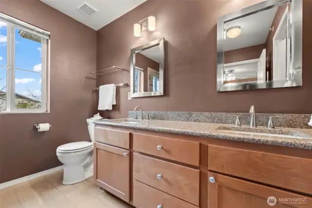 Beautiful updated primary bathroom with a 3/4 bathroom.