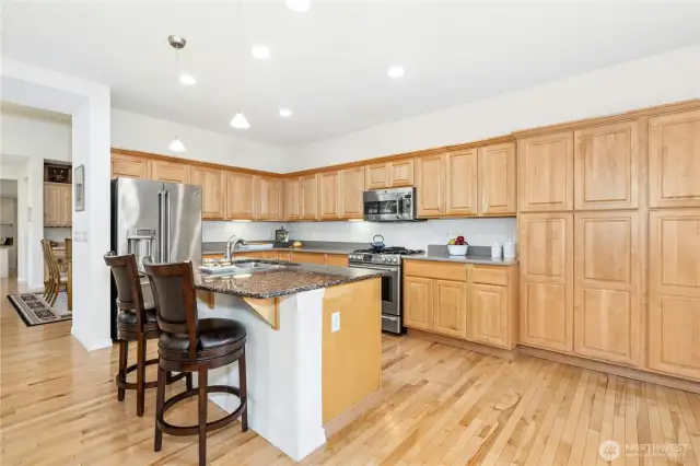 This kitchen is stellar with wood cabinets, granite and stainless.