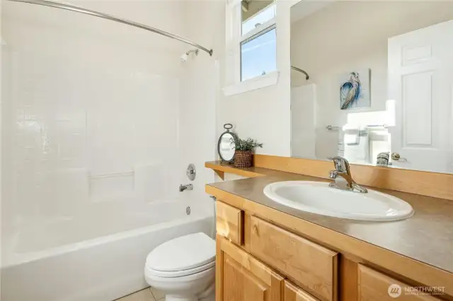 The main hall bath crisp  & clean for you.