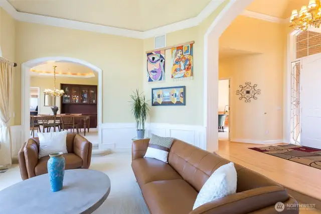 Main living area with a view to the main entry and the dining areas