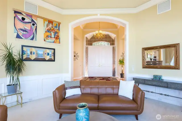 The main living area off the entry, view from the French door to the balcony