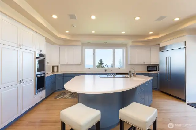 The gourmet kitchen with new appliances and, yes, you can enjoy the waterviews while you’re prepping that awesome meal