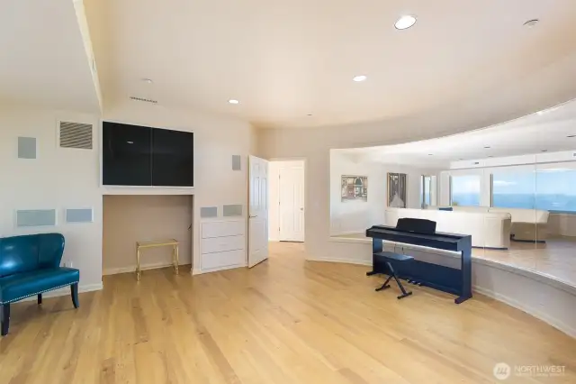 The music room is huge, plenty of room for your baby grand with views of the water as you play