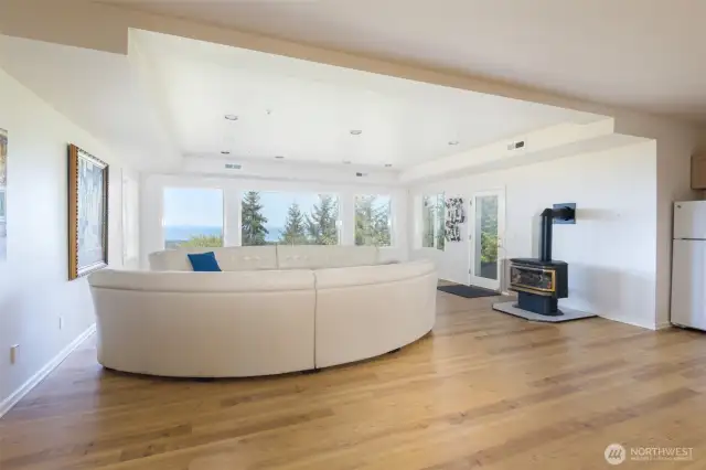 The downstairs living area boasts a kitchenette (only thing missing is a stove/range) with propane stove and more waterviews.