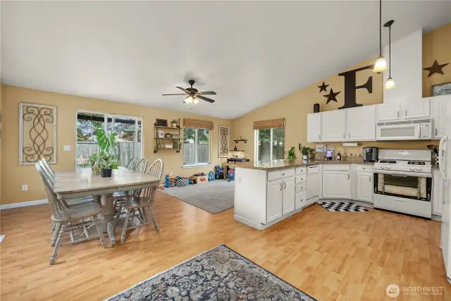 Dining area will hold a large table and chairs for several dinner guests.
