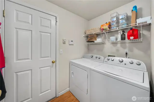 Mudroom/laundry area accesses the garage.