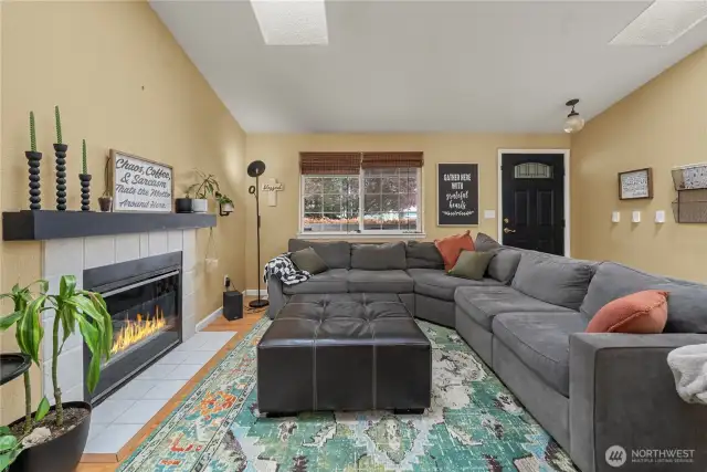 Gather around the warm fireplace for cozy conversation.