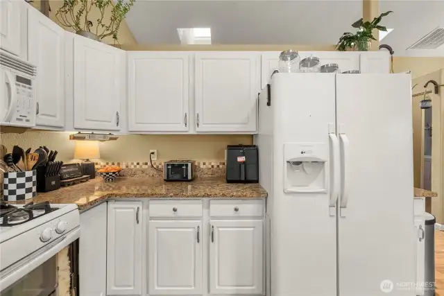 Bright white appliances all included in the sale of the home.
