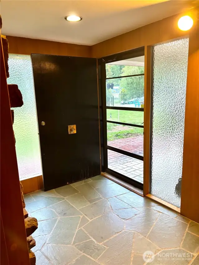 Front entry to home, heated floors throughout!