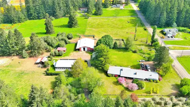 Aerial views of property with home, DADU / kennels, barn, storage shed/ shop, RV /carport, additional outbuilding / barn