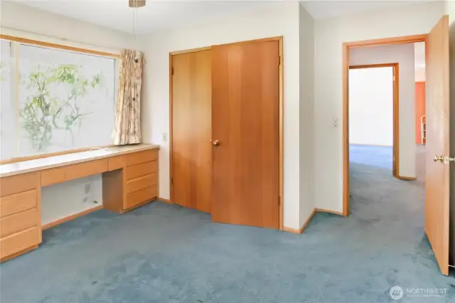 bedroom 1 with built in desk