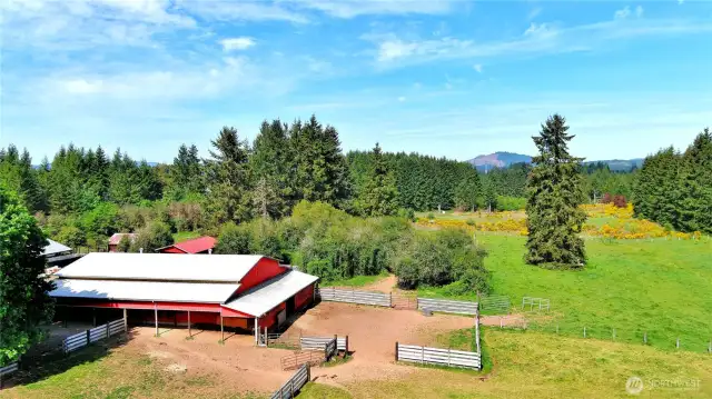 Barn with paddocks and fenced fields