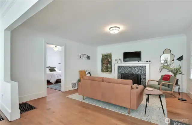 Nice open living room with cozy fireplace.