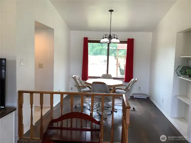 Lots of light and window views to the back yard and extended property.