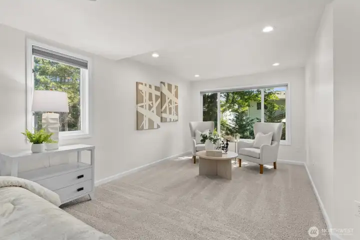 Primary bedroom with sitting room and ensuite bathroom