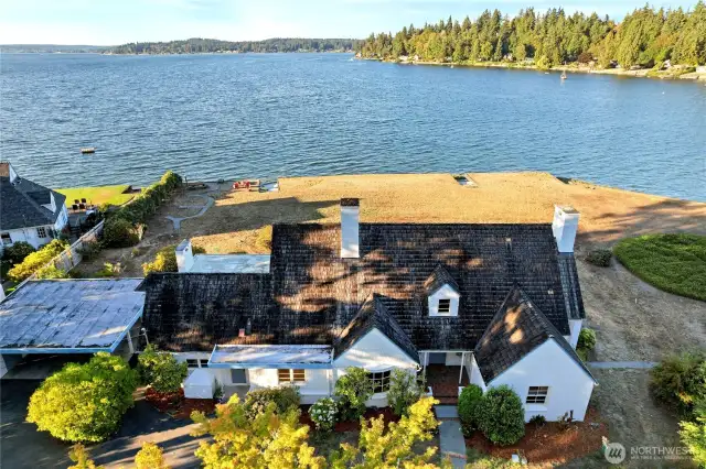 This historic home with its unique cedar butt-shake roof will give you decades more of peace and comfort.