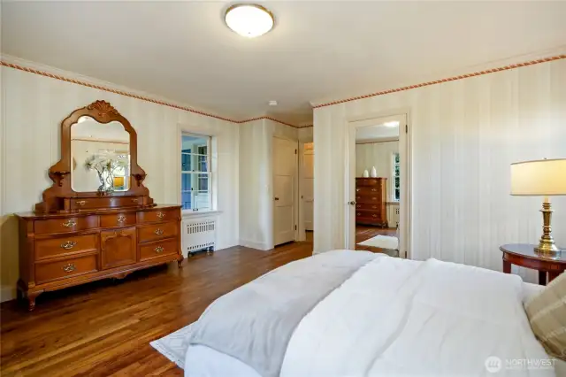 Spacious primary suite on main floor. Two separate closets and custom built-ins provide ample room.