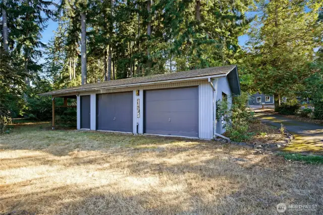 3 car garage/carport.  Perfect to store the boat over winter. This garage was built with trusses, has gas, water, and electric connected or available.  A separate unused septic from a previously existing home means potential conversion to ADU!