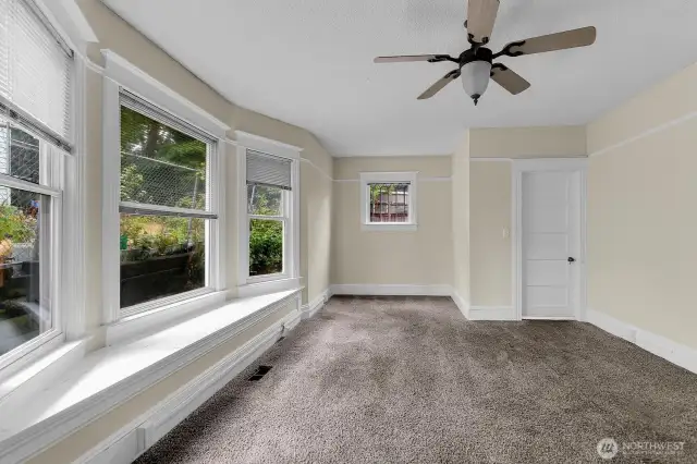 Enormouse dining room with built-in window seat.
