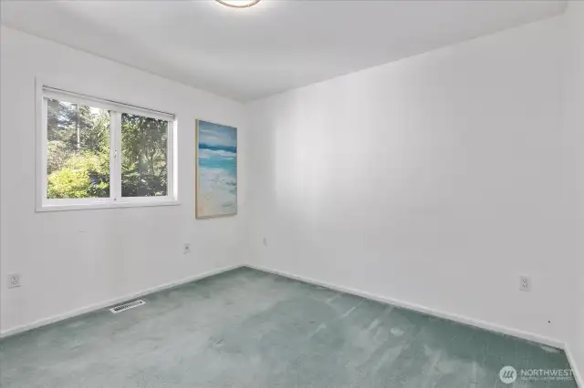 Main floor bedroom 1 of 2.