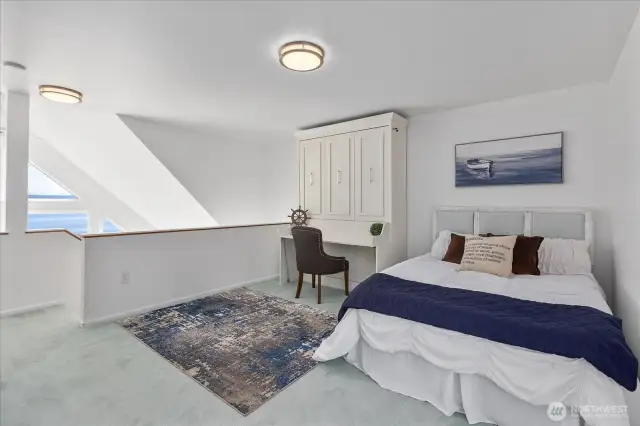Loft doubles as the primary bedroom. Wake up to gorgeous water views and sunrises.