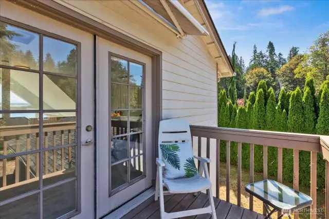Private deck off primary bedroom loft.