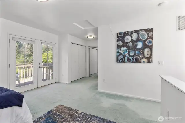 Primary bedroom that is the loft has multiple large closet spaces with private deck and 5 piece ensuite.