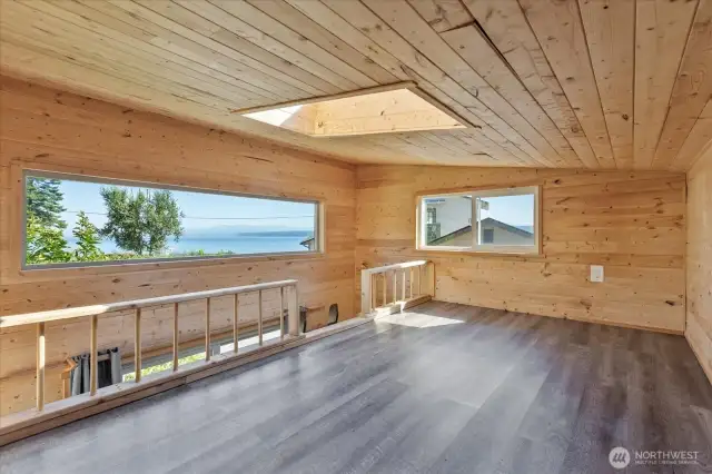 Panoramic views from the upper level of the bunkhouse. Fits a queen bed mattress.