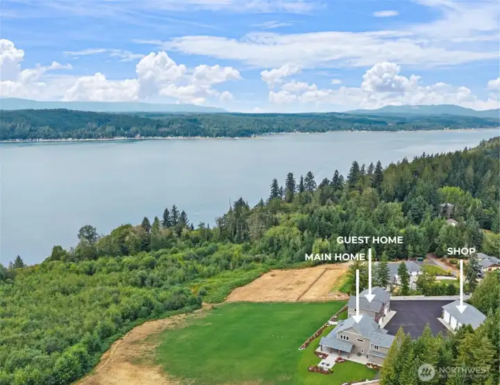 5 Acre estate w/ 3 distinct structures - main home, guest home & garage + additional shop.