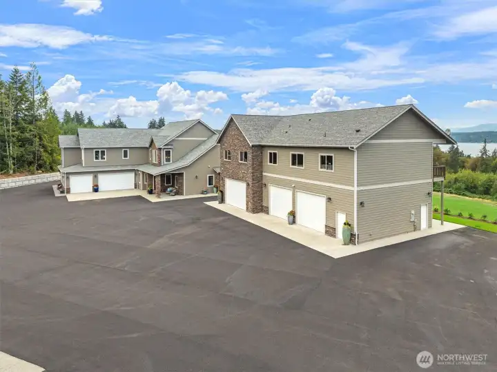 5 Acre estate w/ 3 distinct structures - main home, guest home & garage + additional shop. XL driveway w/ brand new pavement - large enough to land a helicopter!