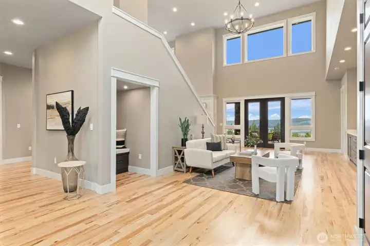 20 FT Soaring Vaulted Ceilings Throughout main level.