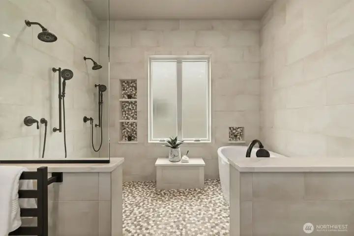 Main floor primary suite  5 piece bath w/ Pental Stella Claudis Quartz Countertops, Soaking Tub, Dual-Shower Heads, Double Vanity, Towel Warmer & "Closet by Design" Walk-in Closet. All Bathrooms w/ Amorho LED Lighting Mirrors.