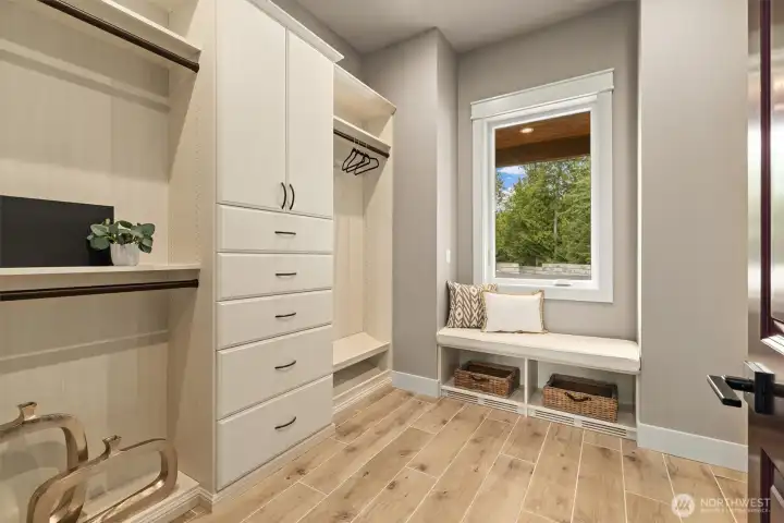 Primary suite "Closet by Design" Walk-in Closet.