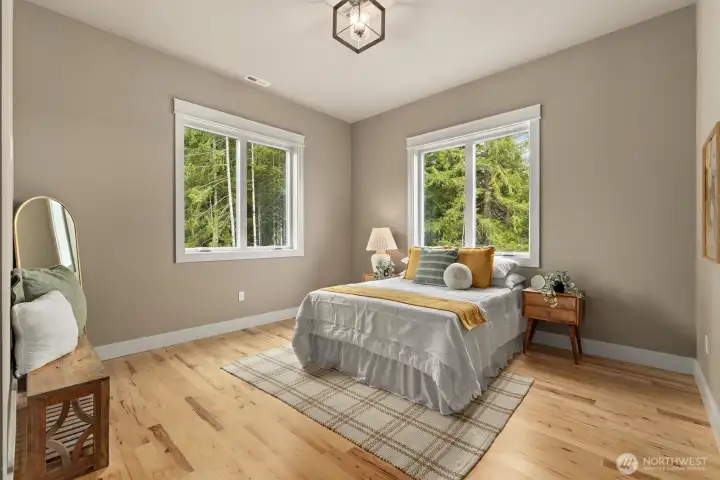 Upstairs bedroom 2 w/ walk-in custom closet.